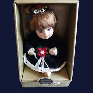 Collectible memories porcelain doll